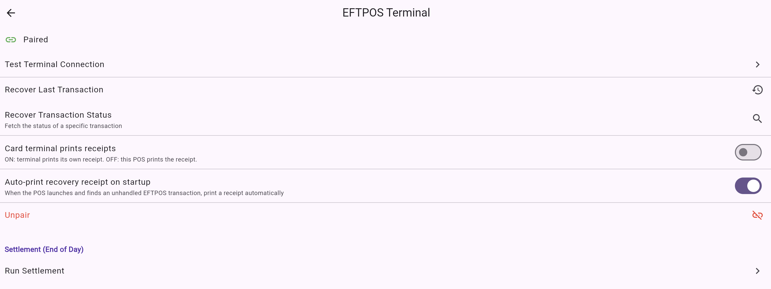 Axis X EFTPOS Terminal screen after pairing: green Paired indicator, Test Terminal Connection, Recover Last Transaction, settings toggles, and an Unpair option